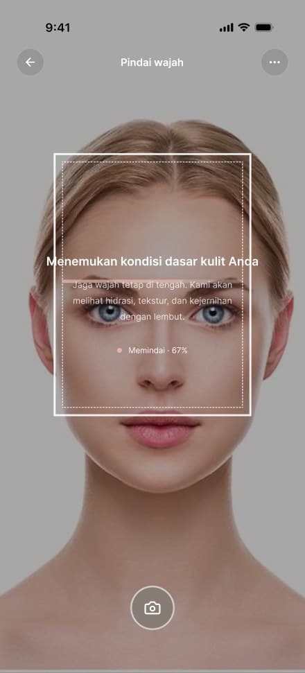 Pemindaian wajah — bingkai penuntun dan indikator progres saat foto dinilai